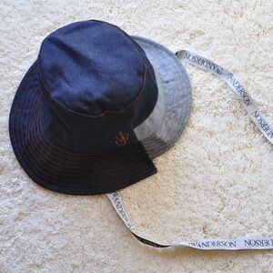 J W ANDERSON Denim Asymmetrical Bucket Hat with Logo Straps